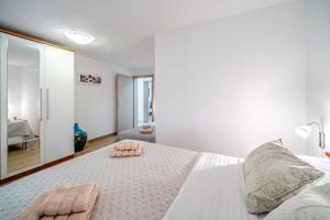 Ein Bett oder Betten in einem Zimmer der Unterkunft Holiday Home Sarbunara