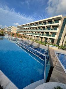 Bazén v ubytování Beach Class Resort - Porto de Galinhas- Praia do Cupe nebo v jeho okolí