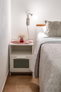 Ein Bett oder Betten in einem Zimmer der Unterkunft Holiday Home Sarbunara