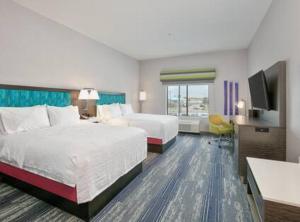 Postel nebo postele na pokoji v ubytování Hampton Inn & Suites Dalhart