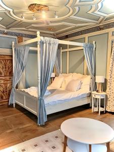 Postel nebo postele na pokoji v ubytování Hotel Corona