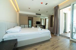 Hotel Umma客房内的一张或多张床位