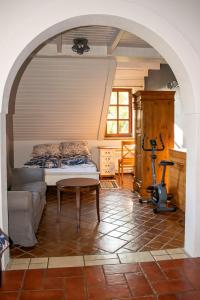a bedroom with a bed and a table in a room at Bieszczadzkie Wytchnienie in Wetlina