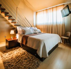 Postel nebo postele na pokoji v ubytování Apartments Villa Marid