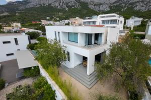 an aerial view of a white house at Villa Simon2 in Veliko Brdo