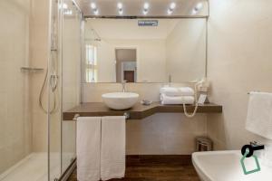 Koupelna v ubytování HOTIDAY Room Collection - Cinisi