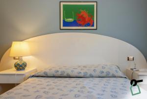 Postel nebo postele na pokoji v ubytování HOTIDAY Room Collection - Cinisi