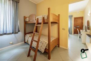 Postel nebo postele na pokoji v ubytování HOTIDAY Room Collection - Cinisi