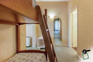 Postel nebo postele na pokoji v ubytování HOTIDAY Room Collection - Cinisi