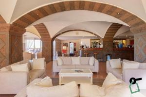 Posezení v ubytování HOTIDAY Room Collection - Cinisi