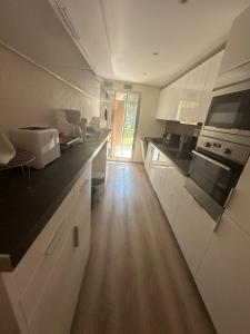 Kuchyň nebo kuchyňský kout v ubytování Luxury apartment