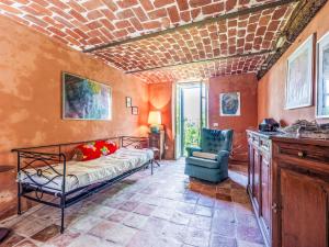 Ένα ή περισσότερα κρεβάτια σε δωμάτιο στο Holiday Home Mainero by Interhome