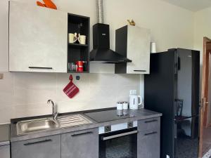 Kuchyň nebo kuchyňský kout v ubytování La Casa dei Limoni