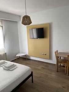 TV a/nebo společenská místnost v ubytování Boho House Florina