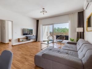 TV a/nebo společenská místnost v ubytování Holiday Home Vujuša by Interhome