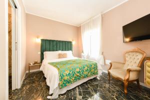 Postel nebo postele na pokoji v ubytování Prestige Suite Via Romagnoli