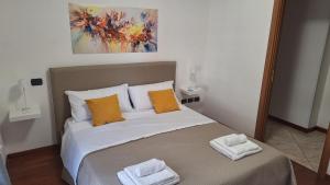 Ένα ή περισσότερα κρεβάτια σε δωμάτιο στο dolce dimora