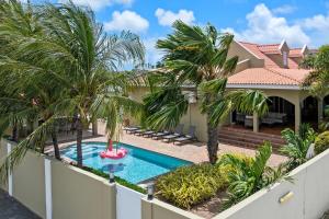 Πισίνα στο ή κοντά στο Palm villa Curaçao - Luxe, kindvriendelijk & zwembad