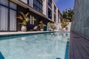 A piscina localizada em Top Studios Canasvieiras TPS ou nos arredores