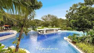 Bassein majutusasutuses Tambuli Seaside Living Residences 1 Bedroom Condominium Unit Tower D Unit 3M või selle lähedal +1 foto