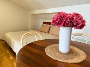Postel nebo postele na pokoji v ubytování Villa Perla Di Mare Budva