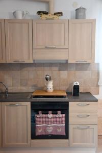 A kitchen or kitchenette at Trullo del Sorriso