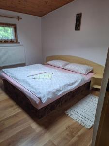 Postel nebo postele na pokoji v ubytování Chata Mária