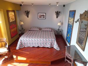a bedroom with a bed in a room at Black Shark Apartments in Lima