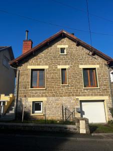 a stone house with a brick at #Brive - Villa Pagnon - Jardin -Calme in Brive-la-Gaillarde