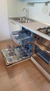 Gallery image of Lovely Mansard Iseo Portelle Holiday da Barbara - private parking & bike storage in Iseo +24 photos