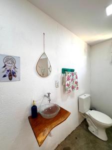 a bathroom with a sink and a toilet at Studio Chica Fulô - Village Capixaba in Gravatá +10 photos