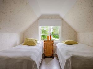 Postel nebo postele na pokoji v ubytování Holiday Home Bygget by Interhome
