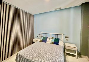 Ένα ή περισσότερα κρεβάτια σε δωμάτιο στο Hostal Baobab +16 φωτογραφίες