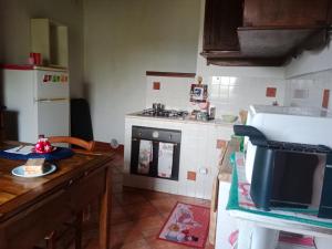 Kuchyň nebo kuchyňský kout v ubytování Casa di gio