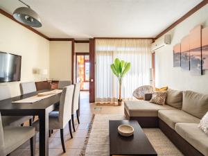 TV a/nebo společenská místnost v ubytování Akisol Troia Savana