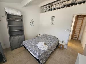 Posteľ alebo postele v izbe v ubytovaní Bel Appartement Duplex