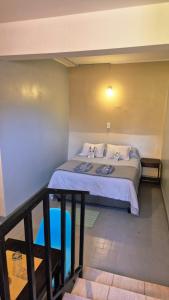 a bedroom with a bed in a room at La Valentina in Purmamarca