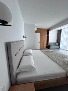 Postel nebo postele na pokoji v ubytování Escape Suites