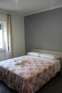 Postel nebo postele na pokoji v ubytování Borgo Marinaro Cetraro, Calabria
