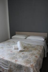 Postel nebo postele na pokoji v ubytování Borgo Marinaro Cetraro, Calabria