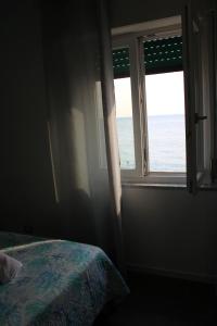 Postel nebo postele na pokoji v ubytování Borgo Marinaro Cetraro, Calabria