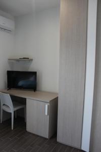 TV a/nebo společenská místnost v ubytování Borgo Marinaro Cetraro, Calabria