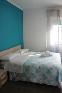 Postel nebo postele na pokoji v ubytování Borgo Marinaro Cetraro, Calabria