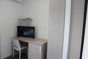 TV a/nebo společenská místnost v ubytování Borgo Marinaro Cetraro, Calabria