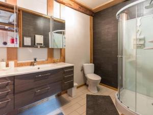 a bathroom with a toilet and a sink and a shower at Charme Authentique au Moulin de Saphoz avec Grand Jardin - FR-1-583-499 in Esmoulières +16 photos