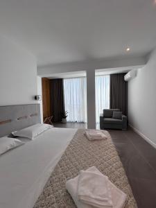 Postel nebo postele na pokoji v ubytování Escape Suites
