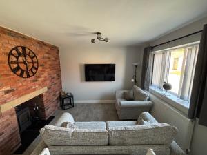 TV a/nebo společenská místnost v ubytování Dans Holiday cottage + 4 fotografie