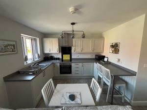 Kuchyň nebo kuchyňský kout v ubytování Dans Holiday cottage