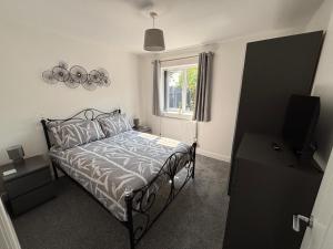 Postel nebo postele na pokoji v ubytování Dans Holiday cottage