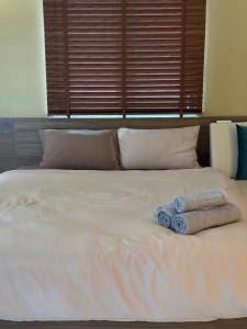 En eller flere senge i et værelse på 601 Đình Thôn